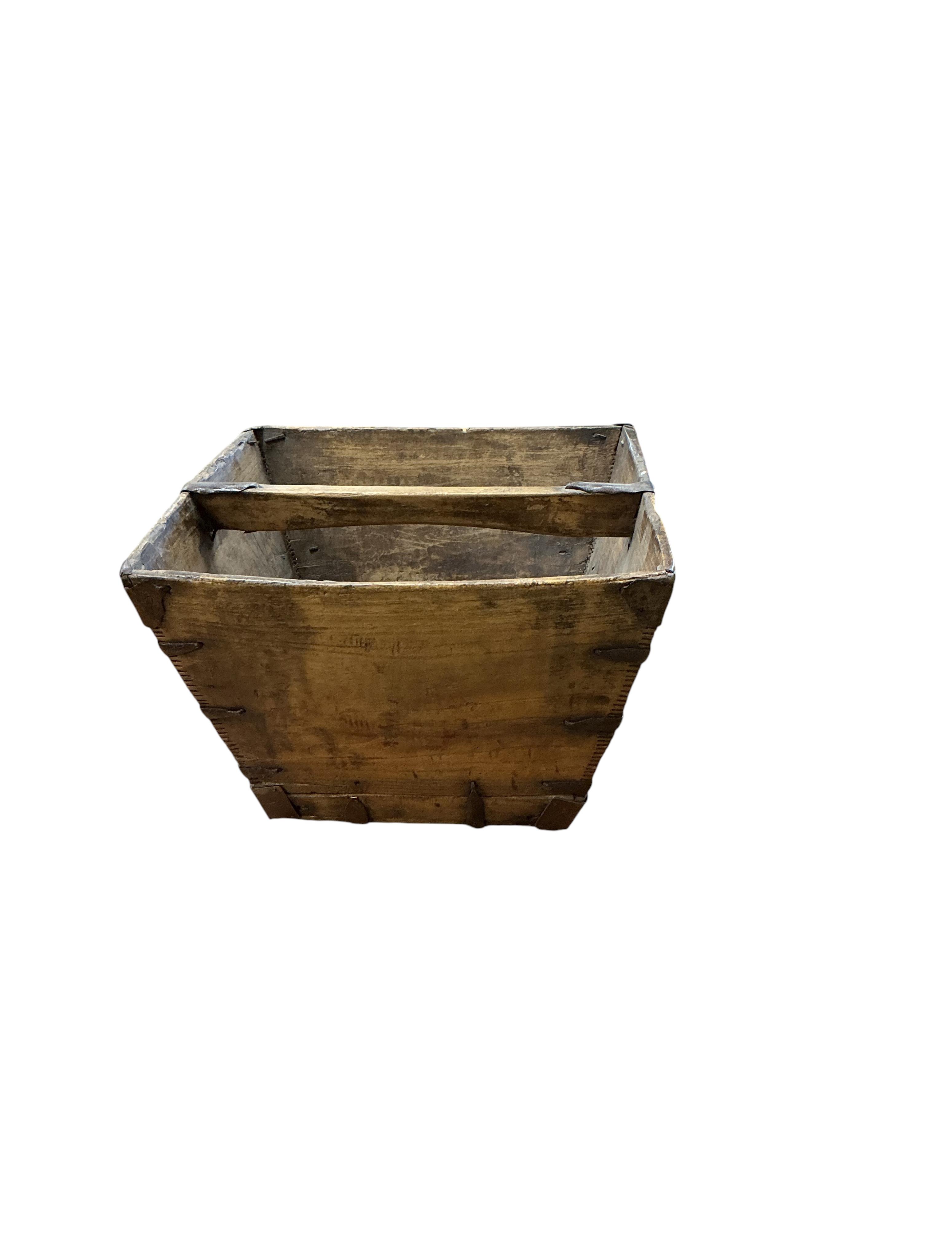 A small Victorian rectangular pine trunk, width 49cm, depth 29cm, height 22cm, together with two Provincial stools, a staved bucket and a measure